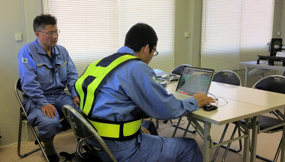 Quality assurance personnel viewing images relayed via the Internet